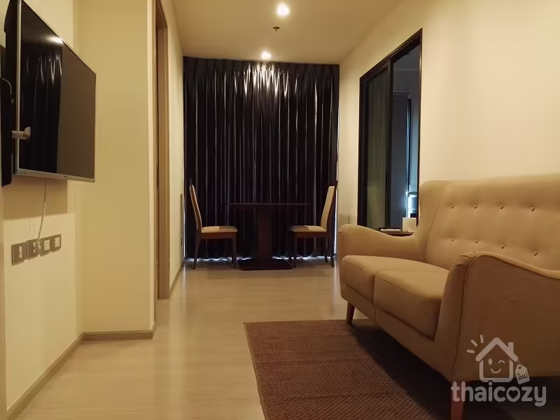 First used outstanding wooden furniture and comfortable sofa with SB cabinet built in. Rhythm Sukhumvit 36-38 Condominium near BTS Thonglor 33 sqm. photo 2